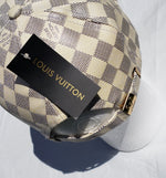 White And Gold Checkered Cap By Louis Vuitton