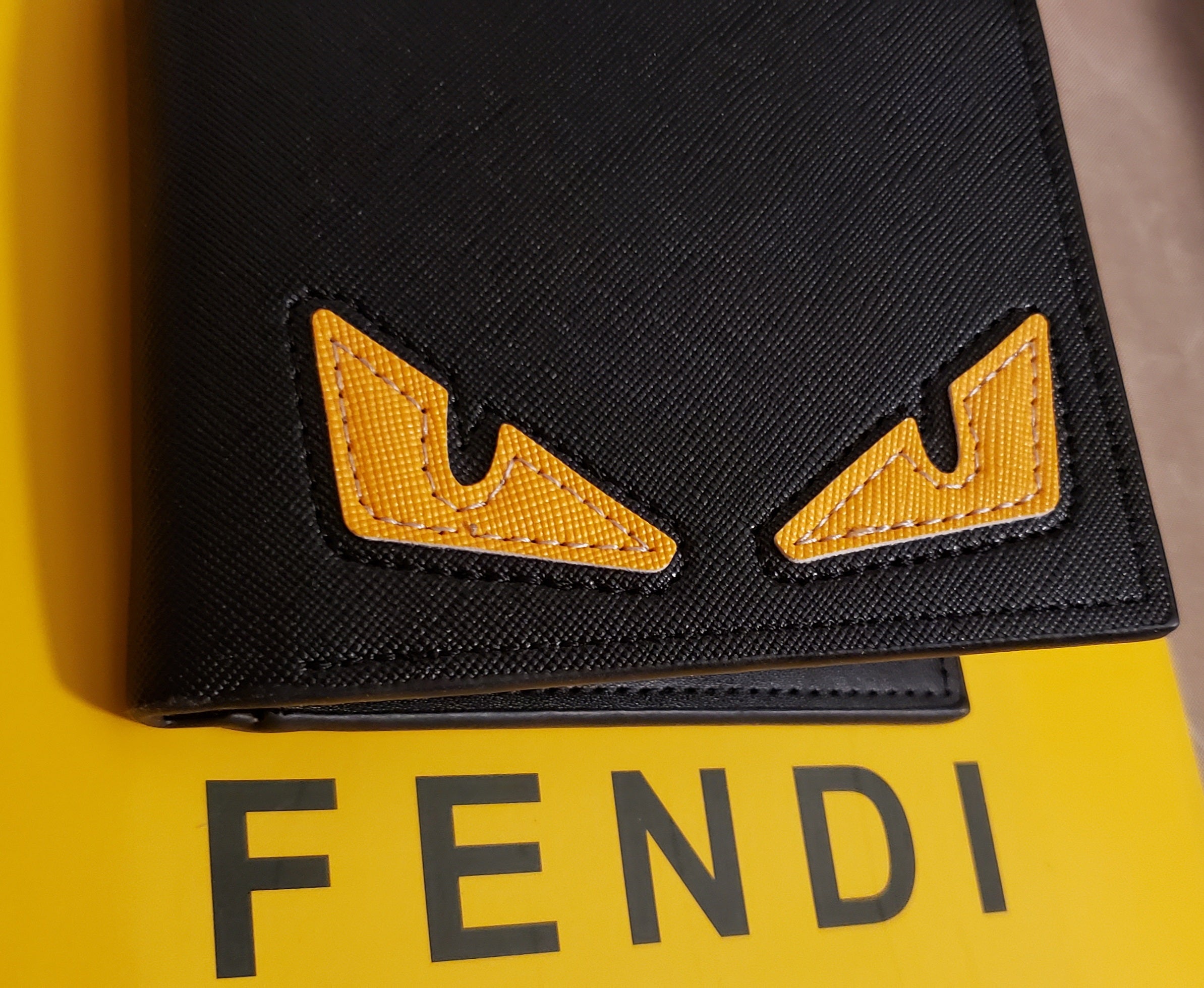 Black With Yellow FENDI Eyes Wallet