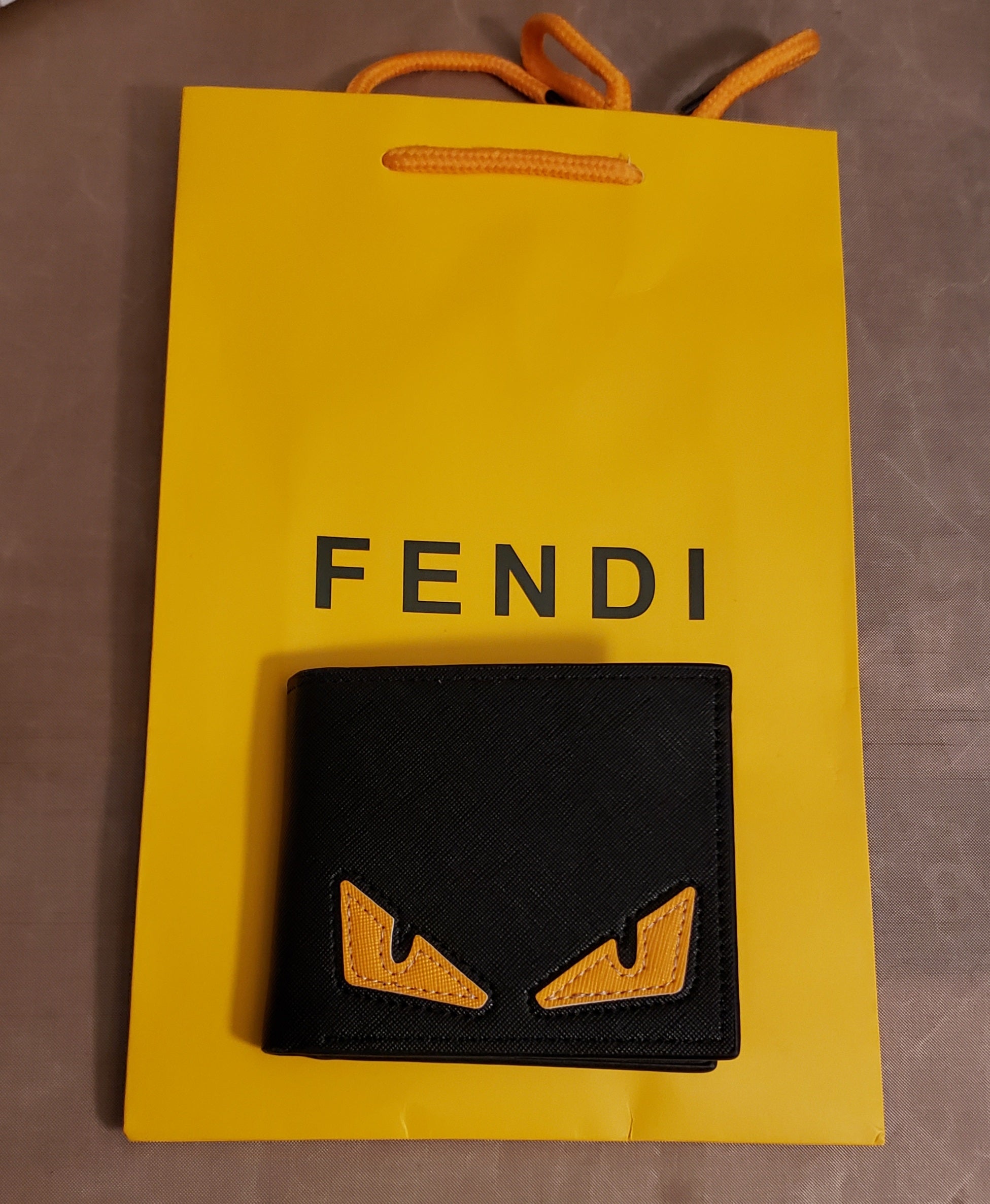 Black With Yellow FENDI Eyes Wallet