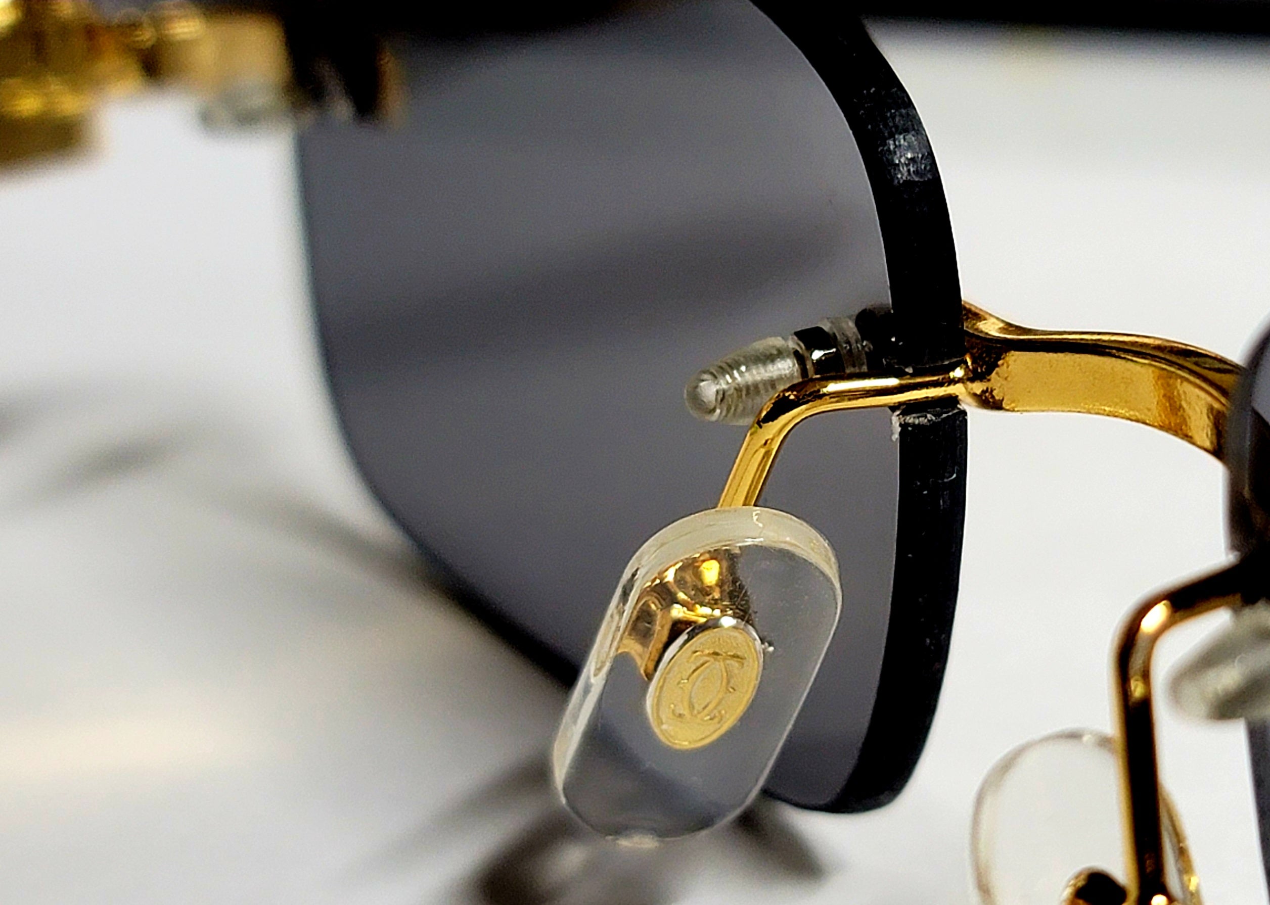 Cartier Rectangular Rimless Shades W/ Gold Accents