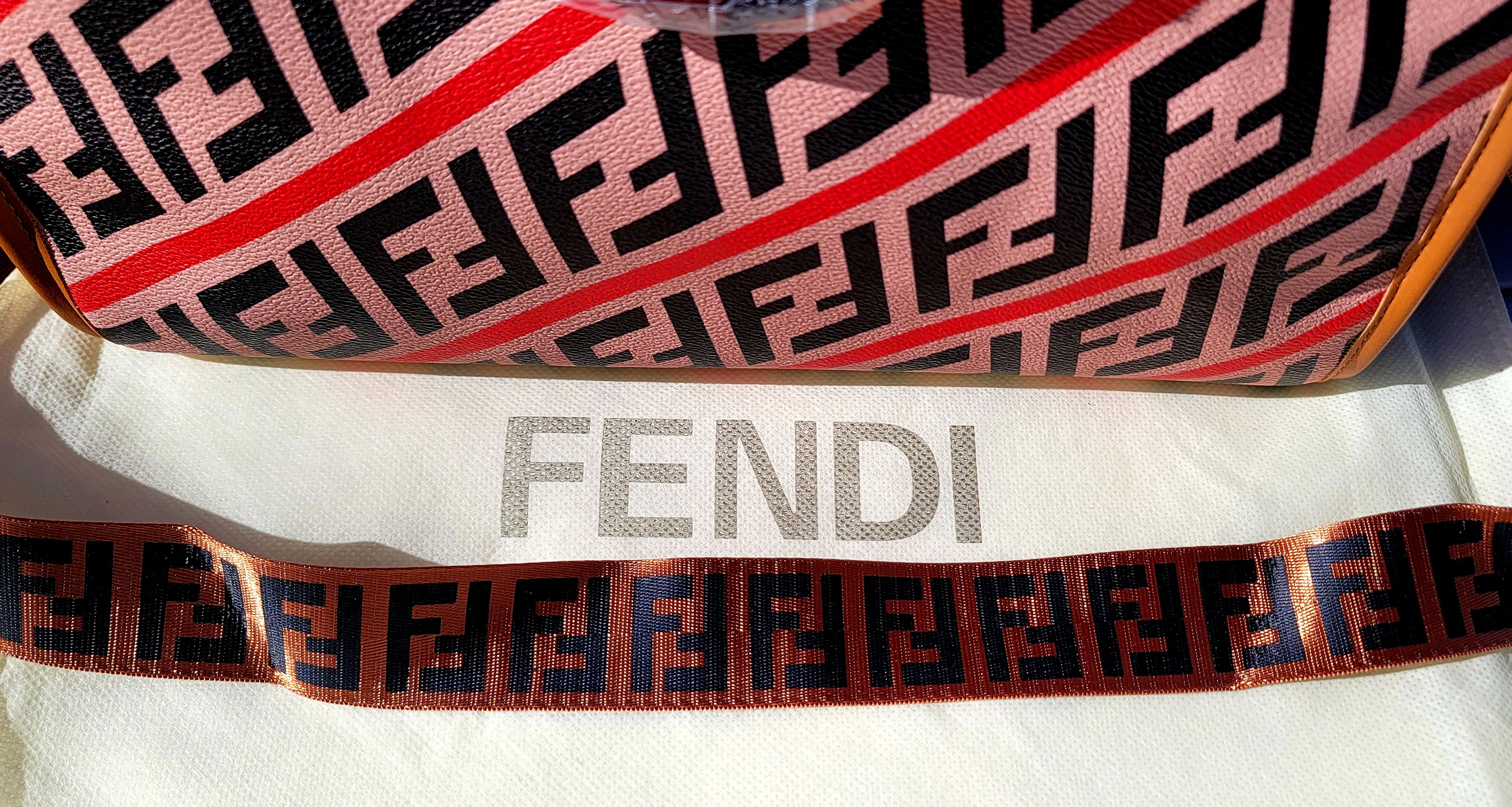 Tan W/ Red And Black Fendi "Strong Woman" Purse